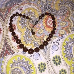 Enamel bead necklace. Brown in color